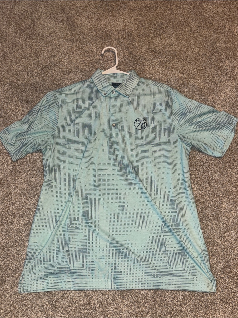 Men's Light Teal Patterned Polo Shirt With A Forest Oaks Logo